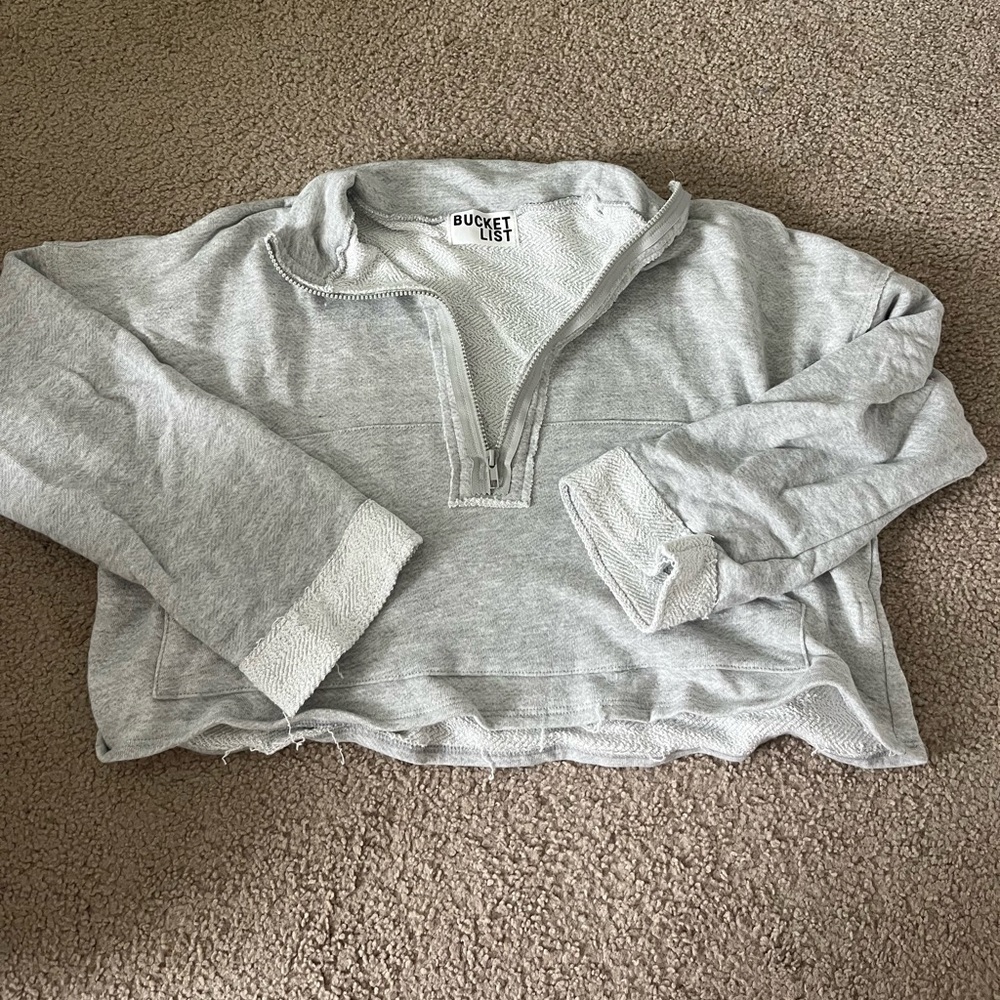 gray zip up from grey bandit
